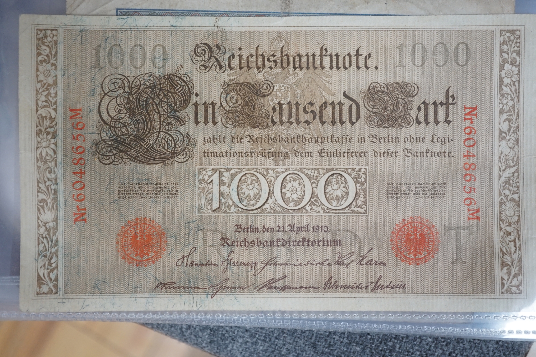 An album of over ninety various worldwide banknotes